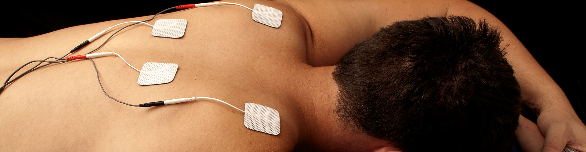 TENS Machine on bare back